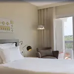 Ozadi Тавира